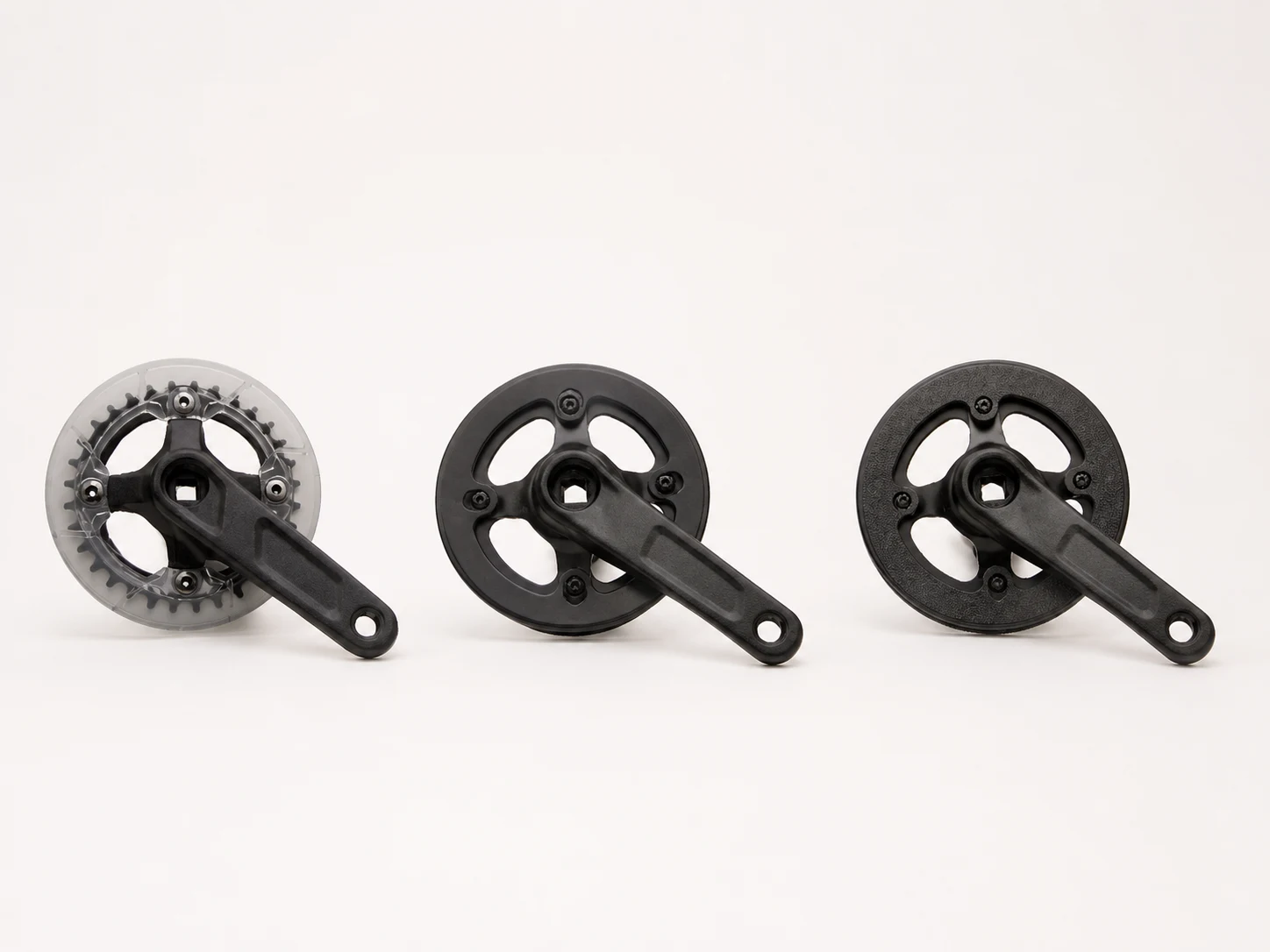 Unbranded compact kids bicycle cranksets on a neutral studio background